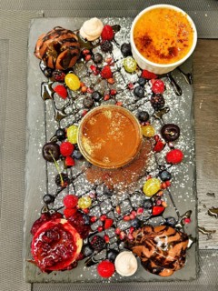 Various art desserts with chocolate and fruit on a decorative platter Lower Austria Austria