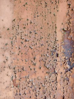 Pink peeling paint with cracked texture on a surface Lower Austria Austria