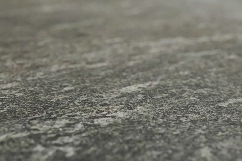 Grey granite surface as background, blurred background, North Rhine-Westphalia, Germany