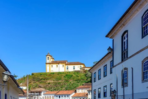 Baroque church on top of the hill among the colonial houses of the city of Ouro Preto, Ouro Preto,