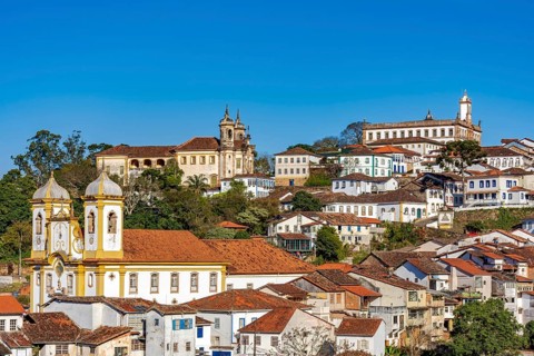View of the historic city of Ouro Preto with a church and mansions in Baroque and Colonial styles,