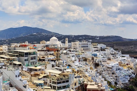 View of Fira, tourist centre with numerous restaurants, shops and hotels, Thira, Santorini,