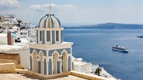 Blue and white bell tower and view of the sea, cruise ship, Firostefani, Thira, Santorini,