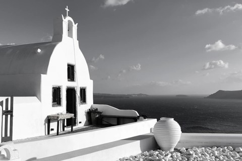 White architecture, orthodox church by the sea, monochrome, Oia, Santorini, Cyclades, Aegean Sea,