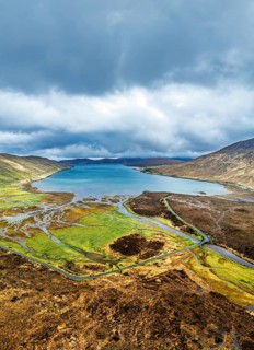 View from Eas a' Bhradain Waterfall from drone, Red Cuillin mountains, Loch Ainort, Isle of Skye,