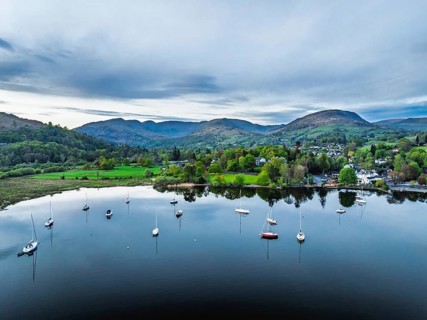 Sunset over Windermere Lake from a drone, Ambleside, Lake District, Cumbria, England, United