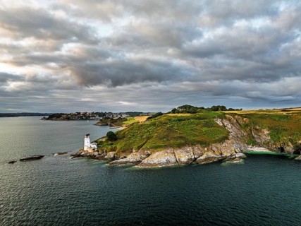 St Anthony Lighthouse from drone, Roseland peninsula, Head circular walk, Cornwall, UK