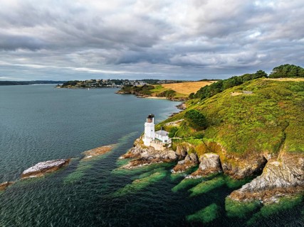 St Anthony Lighthouse from drone, Roseland peninsula, Head circular walk, Cornwall, UK