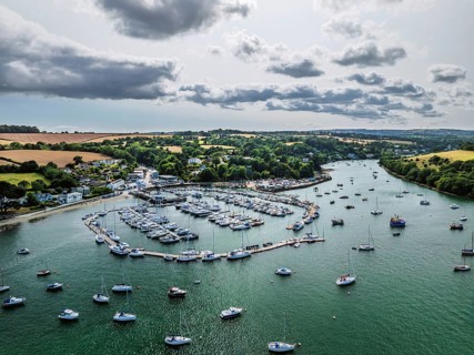 Mylor Churchtown Village from a drone, Carrick Roads, River Fal, Falmouth, Cornwall, UK