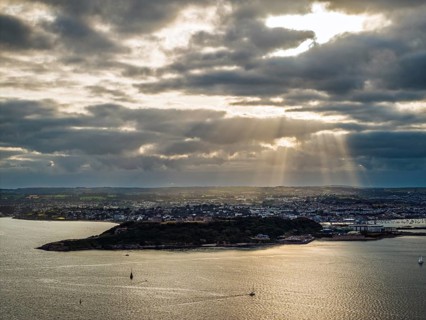Sunset over Pendennis Castle and Pendennis Point from a drone, Falmouth, Cornwall, UK