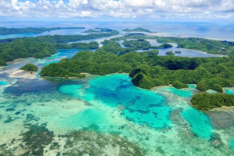 Aerial view of shallow turquoise lagoon of island paradise island state Palau in the Pacific West