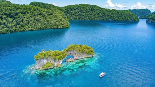 Aerial view bird's eye view of rock arch Natural Arch in lagoon of in island paradise island state