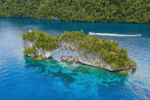 Aerial view bird's eye view of rock arch Natural Arch in lagoon of in island paradise island state
