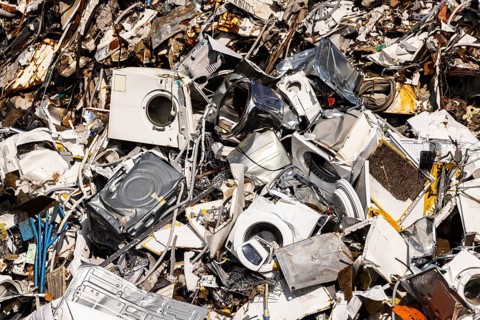 Scrap metal trade in the commercial harbour of Mannheim. Disused household appliances, washing