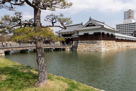 Hiroshima Castle, also known as Carp Castle, entrance gate and moat, replica of the original