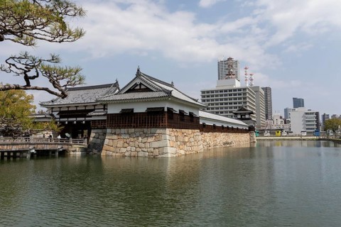 Hiroshima Castle, also known as Carp Castle, entrance gate and moat, replica of the original