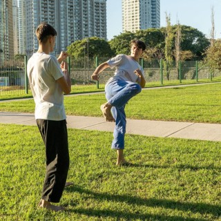 Young martial artists sparring with focus and determination
