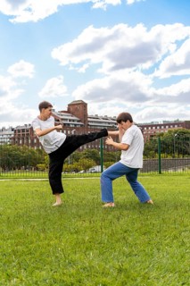 Powerful kicks during an intense Taekwondo practice