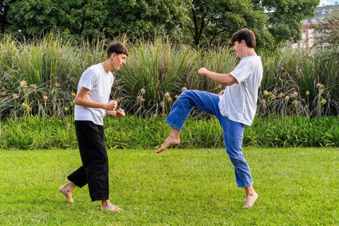 A dynamic Taekwondo session under the sun