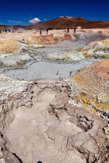 Vast geothermal activity area with fumaroles and people, The mud volcanoes and fumaroles on the