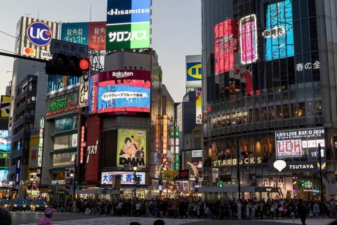 Crowd waiting at the zebra crossing of Shibuya Crossing, world-famous intersection in Shibuya