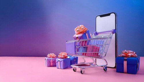 A modern online shopping concept featuring a smartphone, a shopping cart, and multiple gift boxes