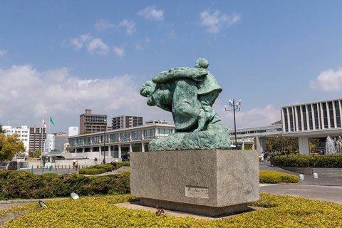 Statue of mother and children in the storm, bronze statue by the artist Shin Hongo in front of the