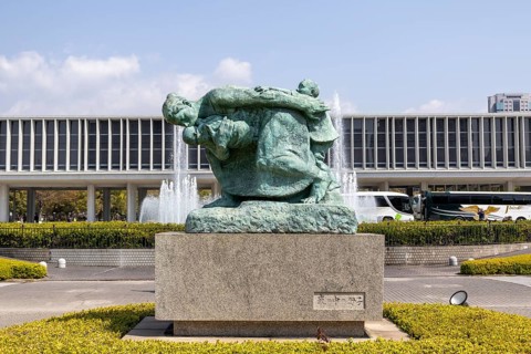 Statue of mother and children in the storm, bronze statue by the artist Shin Hongo in front of the