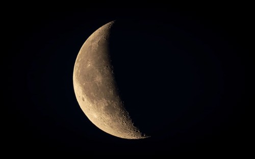 Waxing moon in the clear night sky. Niederursel, Frankfurt am Main, Hesse, Germany