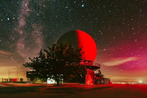 Milky Way above red radar dome. Wasserkuppe, Rhön, Hesse, Germany
