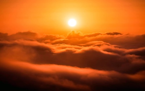 Bright sunrise over the sea of fog. Dettweiler Tempel, Königstein im Taunus, Hesse, Germany