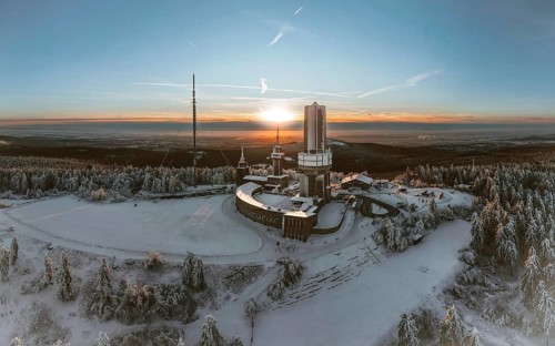 Winter landscape with atmospheric sunset. Großer Feldberg in the Taunus, Hesse, Germany