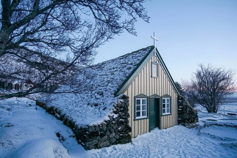 Icelandic peat church in the snow. Golden Circle, Iceland