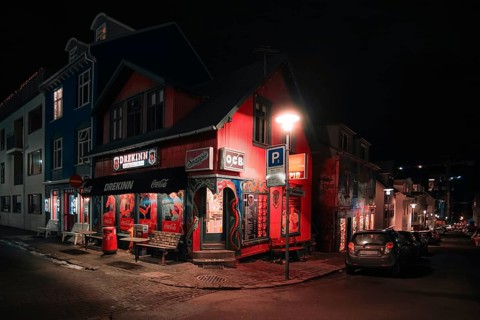 A stylish fast food restaurant in the centre of Rejkjavik at night. Rejkjavik, Iceland