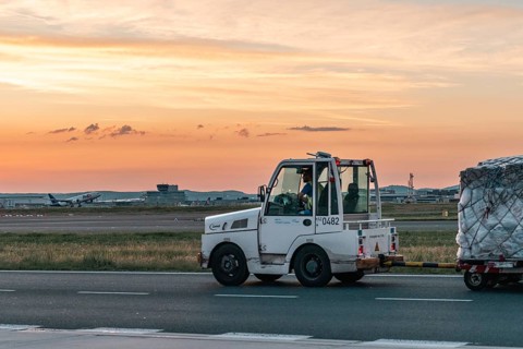 Cargo driver between runway and sunset. Frankfurt Airport, Hesse -Germany