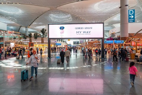 Airport terminal with travellers and shops. Istanbul Airport, Arnavutköy, Istanbul, Turkey
