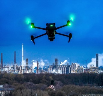 Symbolic image, photomontage, reconnaissance, spying with drones in industrial plants, critical