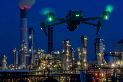 Symbolic image, photomontage, reconnaissance, spying with drones in industrial plants, critical