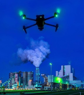 Symbolic image, photomontage, reconnaissance, spying with drones in industrial plants, critical