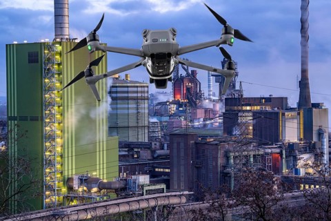 Symbolic image, photomontage, reconnaissance, spying with drones in industrial plants, critical