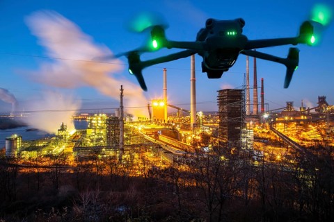 Symbolic image, photomontage, reconnaissance, spying with drones in industrial plants, critical