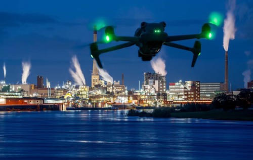 Symbolic image, photomontage, reconnaissance, spying with drones in industrial plants, critical