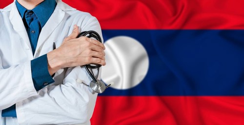 Doctor with stethoscope on Laos flag. Doctor holding stethoscope on Laos flag