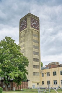 Clock tower of the old sewing machine factory, Bad Wilsnacker Straße, Wittenberge, district of