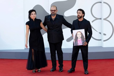 Venice, Italy - 3 September 2025: Clara Khoury, Amer Hlehel, Motaz Malhees with a portrait of