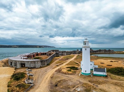 Hurst Point Lighthouse and Hurst Castle from drone over Hurst Spit, Milford on Sea, Lymington,