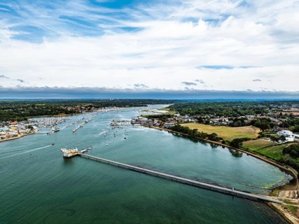 River Hamble over Warsash Maritime Academy Pier from drone, Hamble-le-Rice, Warsash, Southampton