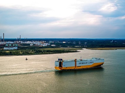 Grimaldi Lines Vehicles Carrier Grande Texas over refinery Esso Oil Terminal from drone,