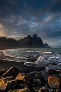 Mountains, mountain range, beach, sea, waves, surf, reflection, clouds, evening light, coast,