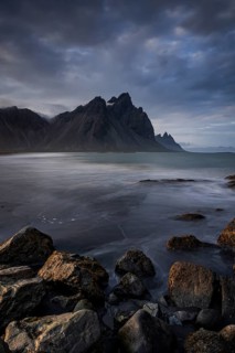 Mountains, mountain range, beach, sea, waves, surf, reflection, clouds, evening light, coast,